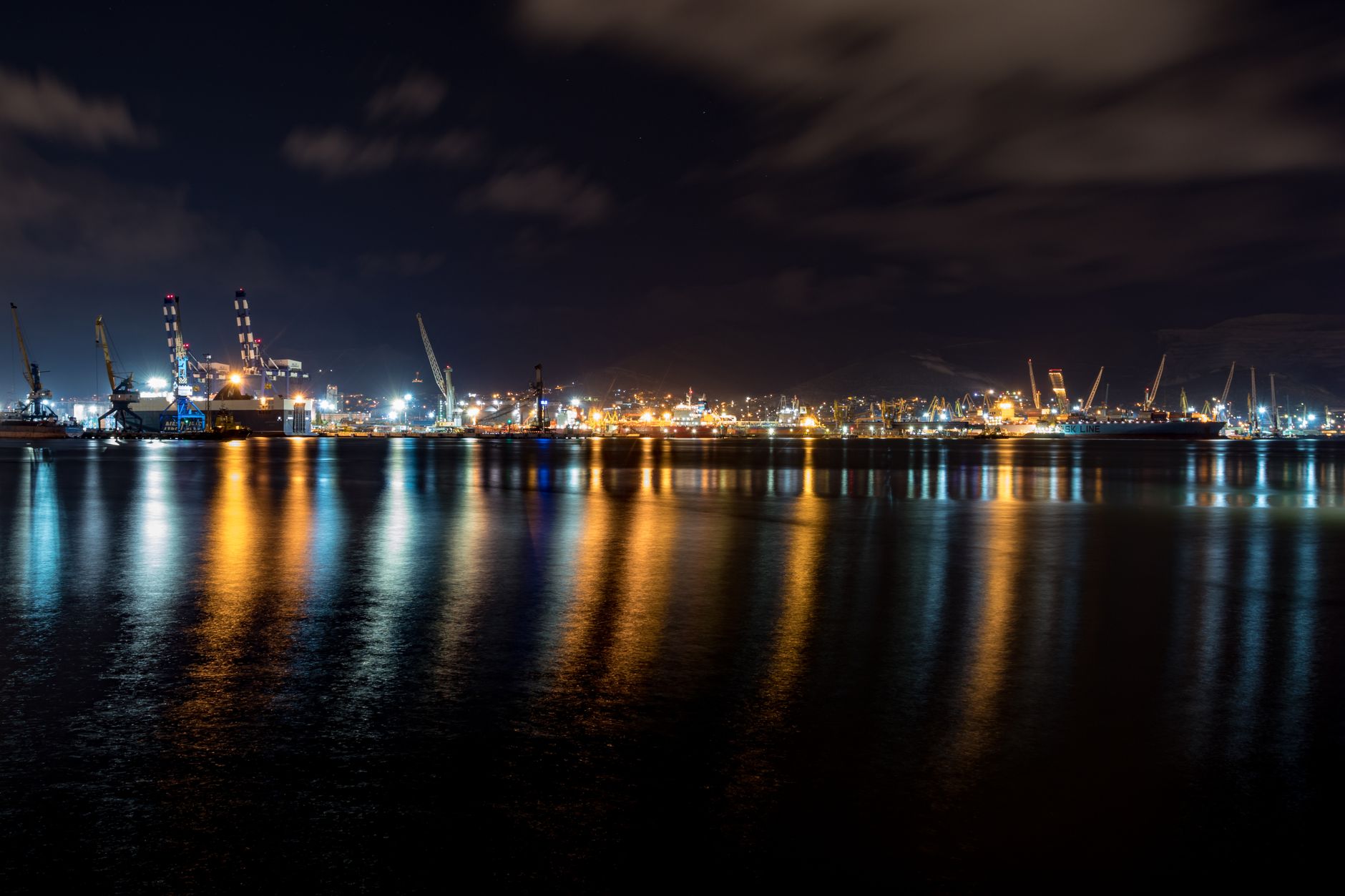 Container ships and cranes at the Port of Luanda, Angola's main cargo gateway