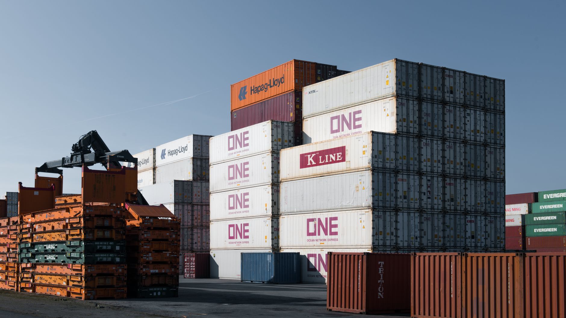 Container gantry cranes and stacked shipping containers at the Port of Lagos, Nigeria's main cargo gateway