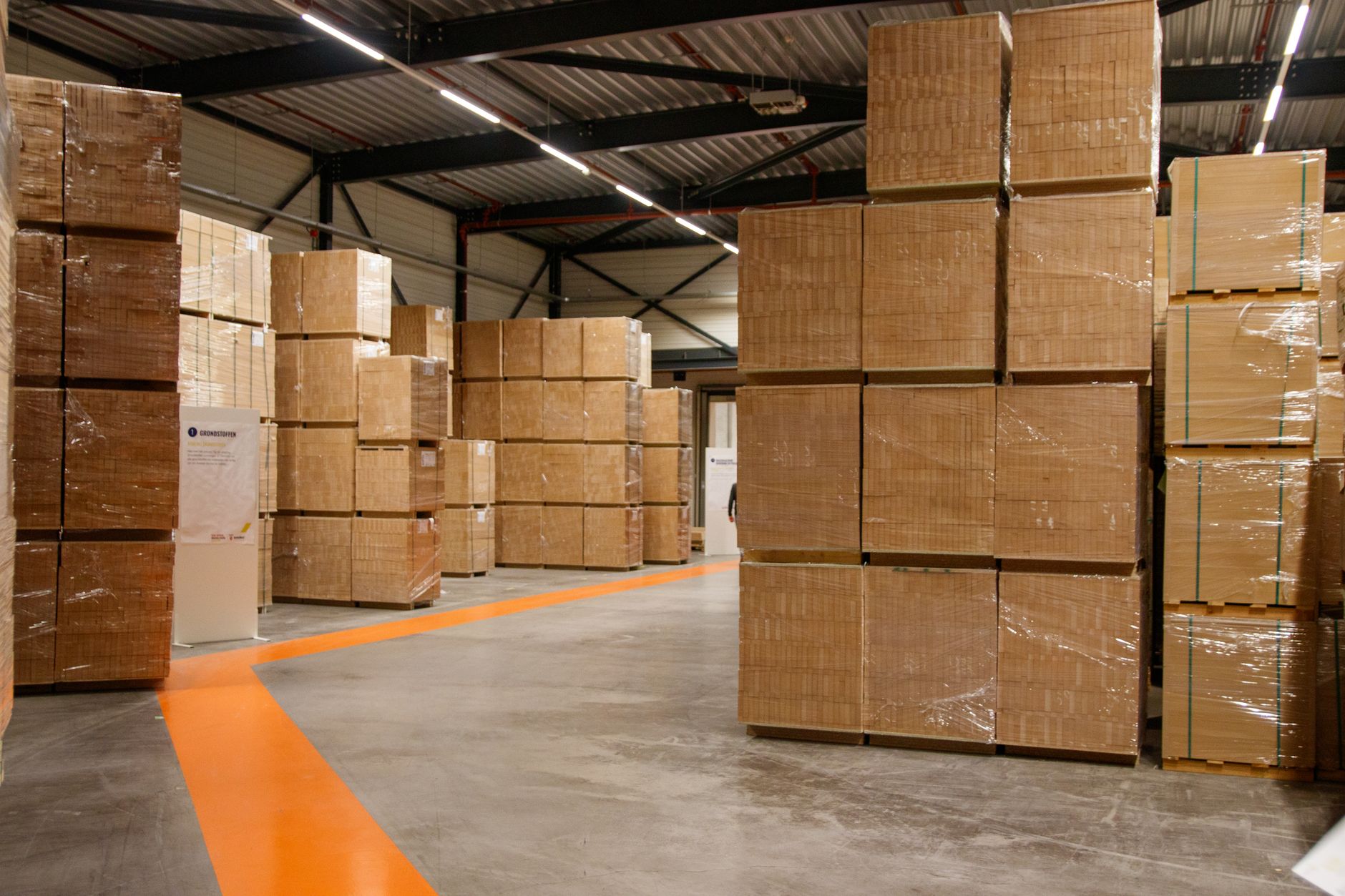 Stacked cartons of frozen pork in a cold-storage warehouse before export