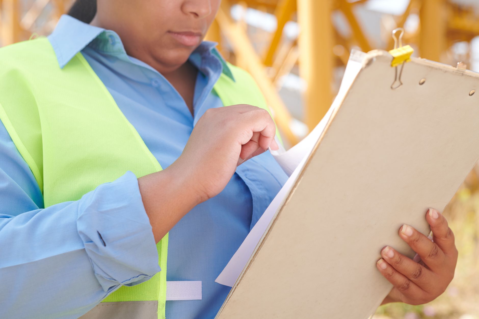 Customs officer reviewing halal certificate and shipping documents at a port
