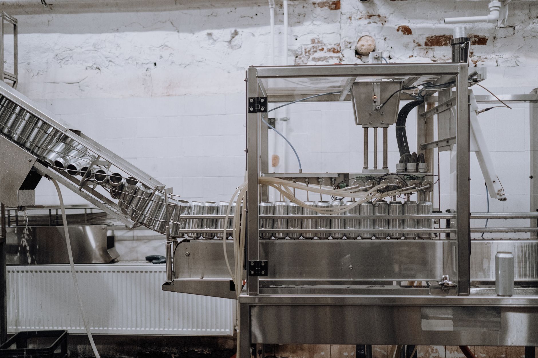 Workers on a production line inside a meat processing plant